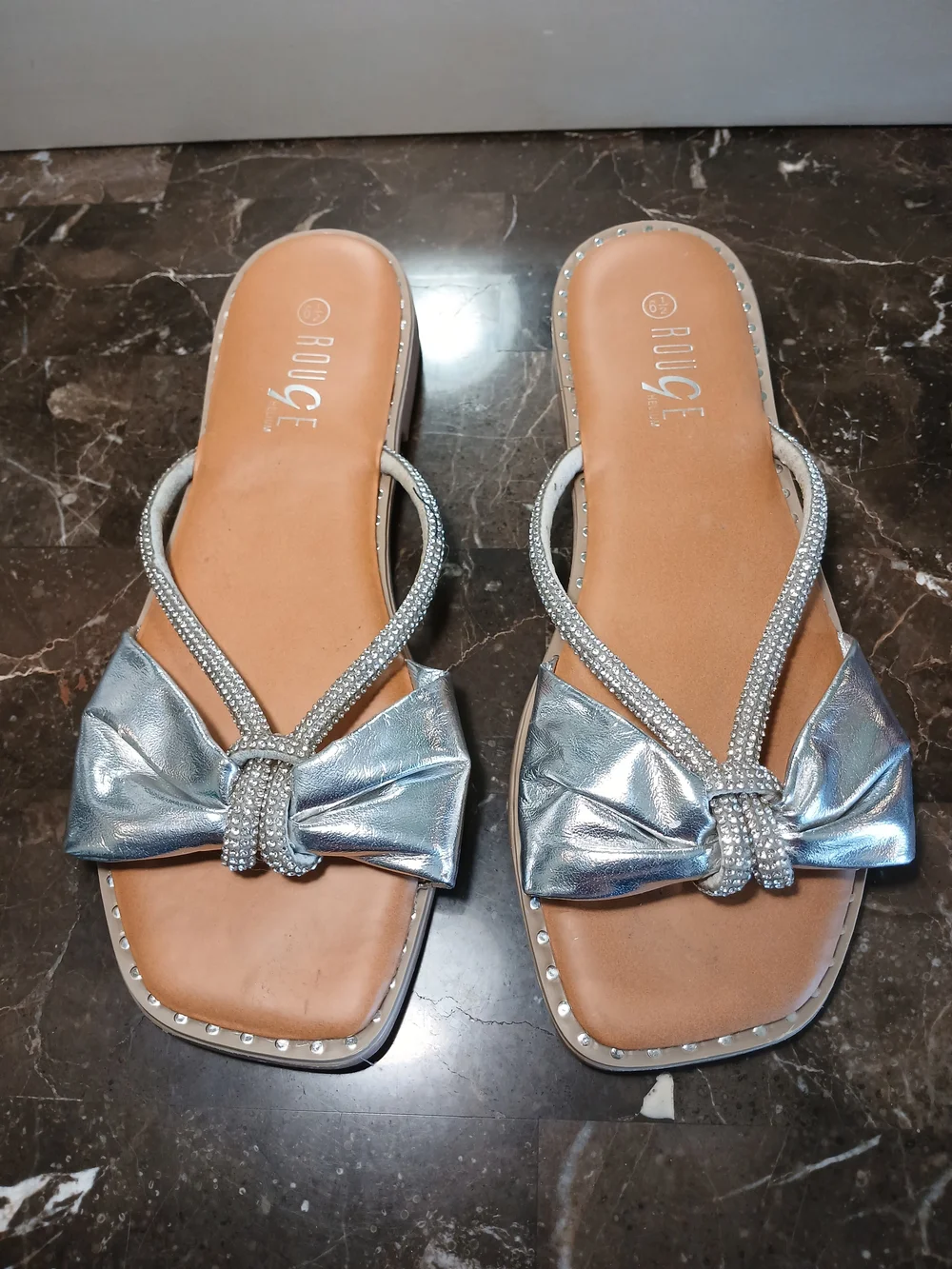 Rouge Helium Silver Bow Slide Sandals - Women's Metallic Slip-On